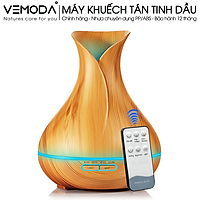 Máy xông tinh dầu cao cấp Tulip 550ml Có Remote. Tặng kèm lọ tinh dầu cam ngọt cao cấp (Đức 10ml). Giúp khuếch tán, tỏa hương tinh dầu, tạo độ ẩm, xông phòng.