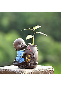 Tượng chú tiểu cưỡi cá chép - trồng cây, cắm hoa để bàn