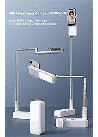 Gậy livestream thông minh kèm đèn DOXG-V6 - Điều chỉnh chiều cao lên đến 1.3m - Góc quay 360 độ - Gấp gọn dễ dàng - Sử dụng pin sạc dung lượng cao - Ánh sáng 3 màu, 7 chế độ - Kèm remote bluetooth chụp hình, quay phim từ xa