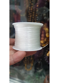 Cuộn Dây Thun CO GIÃN màu Trắng xỏ vòng hạt chuỗi Dây này là dây thun chuyên xỏ vòng chuỗi màu Trắng, có đủ màu Anh Chị đang đeo chuỗi muốn thay dây khác cho vòng thì đặt cuộn Thun chỉ này nhé