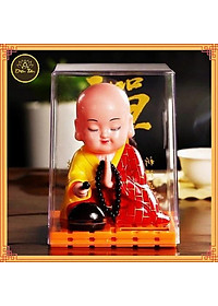 Tượng phật tụng kinh- chú tiểu gõ mõ tụng kinh để taplo trang trí xe hơi ô tô dùng năng lượng mặt trời