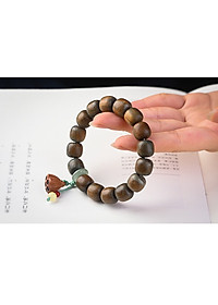 VÒNG TAY CHUỖI HẠT PHẬT GIÁO CÓ ĐÀI SEN BẰNG GỖ ĐÀN HƯƠNG XANH ĐỔI MÀU