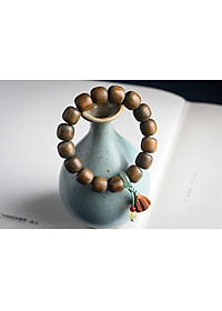 VÒNG TAY CHUỖI HẠT PHẬT GIÁO CÓ ĐÀI SEN BẰNG GỖ ĐÀN HƯƠNG XANH ĐỔI MÀU