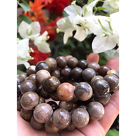 Vòng Gỗ Hóa Thạch Màu Vân Tự Nhiên Bóng Đẹp Nam Đeo 14mm Màu Nâu Sáng Bóng Vàng Nhẹ Nam đeo vào tay đẹp sang tốt rẻ nữa ạ