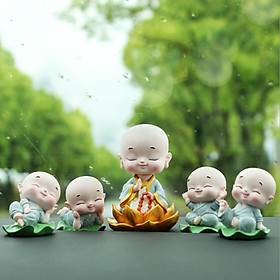 Bộ 04 chú tiểu ngồi lá sen kèm 01 chú tiểu lò xo ngồi đài sen