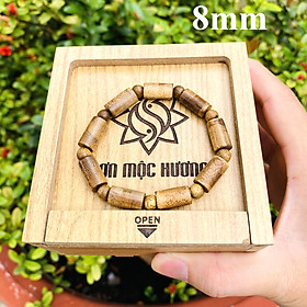 Vòng tay trầm hương tốc phong thủy trụ trúc 9 trụ 9 tròn nam nữ Sơn Mộc Hương mang lại may mắn, bình an và tài lộc cho người đeo