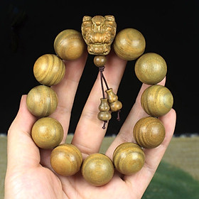 VÒNG TAY ĐẦU RỒNG GỖ ĐÀN HƯƠNG XANH 20ly