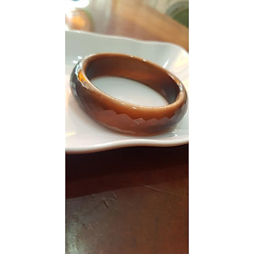 Vòng tay nữ đá mắt mèo giác màu nâu đất mới đẹp lạ Vòng tay Ni 55mm x Cao 16mm x dầy 7,5mm nữ 52kg - 56kg ạ