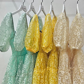Đầm hoa vàng hở eo chất vải lụa hoa nổi cao cấp