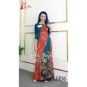 Áo dài Đông Hưng nền xanh đỏ gân chìm in hoa hồng AH06