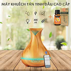 Máy xông tinh dầu cao cấp Tulip 550ml Có Remote. Tặng kèm lọ tinh dầu cam ngọt cao cấp (Đức 10ml). Giúp khuếch tán, tỏa hương tinh dầu, tạo độ ẩm, xông phòng