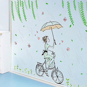 Decal dán tường chất liệu PVC loại 1 dày dặn, sắc nét, trang trí quán cafe, phòng khách- Cô gái đạp xe dưới mưa- mã sp XL7220