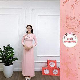 Áo dài hồng lụa mỹ bay tà kết nơ cổ cách điệu