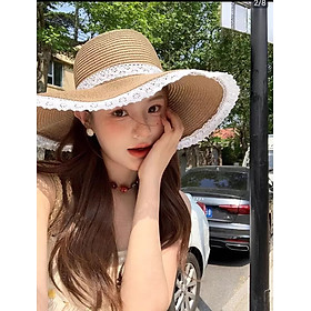 Nón rộng vành mũ vành rộng gấp gọn che nắng đi biển cho nữ phối đai ren duyên dáng chất liệu cói thoáng mát Thiết kế thời trang: Nón rộng vành, phù hợp cho các hoạt động ngoài trời như đi biển. Mũ có đai ren duyên dáng, tăng thêm vẻ nữ tính Dona25072501