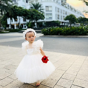 Váy công chúa đầm công chúa thiết kế chấm bi trắng xẻ lưng kẹp nơ cho bé gái từ 1 -10 tuổi tại Mom's choice
