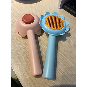 CÓ HỘP - Lược chải lông gỡ rối cho chó mèo hình hoa dướng dương có nút bấm đẩy lông thừa