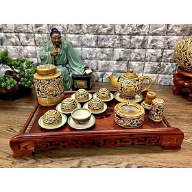 Mua Bộ trà Bát Tràng khắc nổi hoa mẫu đơn dáng chân cao