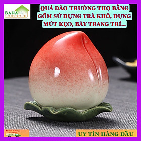 QUẢ ĐÀO TRƯỜNG THỌ BẰNG GỐM SỨ ĐỰNG TRÀ KHÔ, ĐỰNG MỨT KẸO, BÀY TRANG TRÍ Quả trà Đào gốm giá trị cao. có một hình dáng độc đáo, trông tươi và đầy đủ, và có một bề mặt sáng bóng.sử dụng để bảo quản trà, kẹo, đường