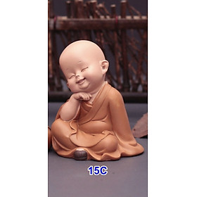 Tượng chú tiểu áo nâu dễ thương