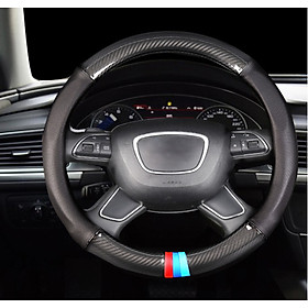 Bọc vô lăng TTAUTO cho xe ô tô từ 4 đến 7 chỗ chất liệu da vân carbon cao cấp màu đen có vòng định vị