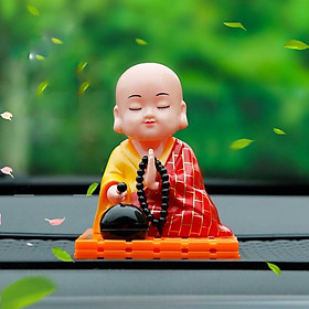 Mua tượng phật gõ mõ tụng kinh năng lượng mặt trời để taplo trang trí xe hơi ô tô