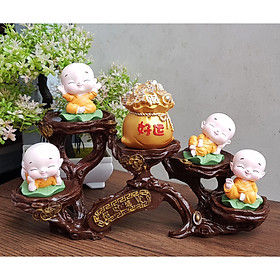 Bộ 04 tượng chú tiểu ngồi lá sen kèm chum vàng và chân đế ngang 5 ánh vàng