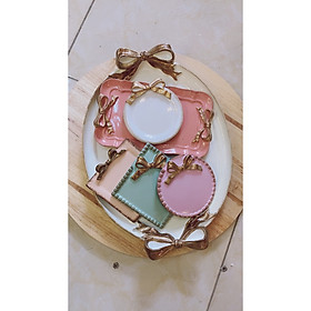 Mua Khay nơ bầu dục sứ sắc màu