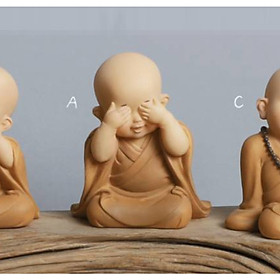 Tượng chú tiểu áo nâu dễ thương