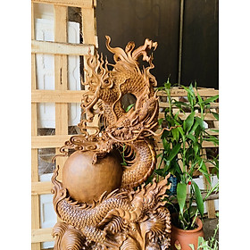 Tượng con rồng ,nhất long vờn ngọc trang trí phong thủy , bằng gỗ gù nu hương hàng siêu đẹp đục kỹ kt cao 120 _(105)×50×15cm