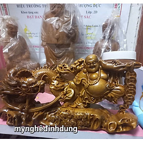 Tượng phật di lặc kéo rồng cuốn kt 20x10x7cm bằng  gỗ  bách xanh thơm nức