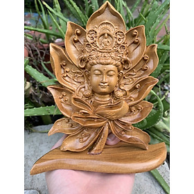 Diện phật khắc nằm trong lòng bông hoa sen ,bằng gỗ bách xanh thơm nức kt 16×15×6cm 