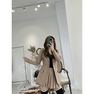 Bộ áo khoác vest và chân váy xếp ly