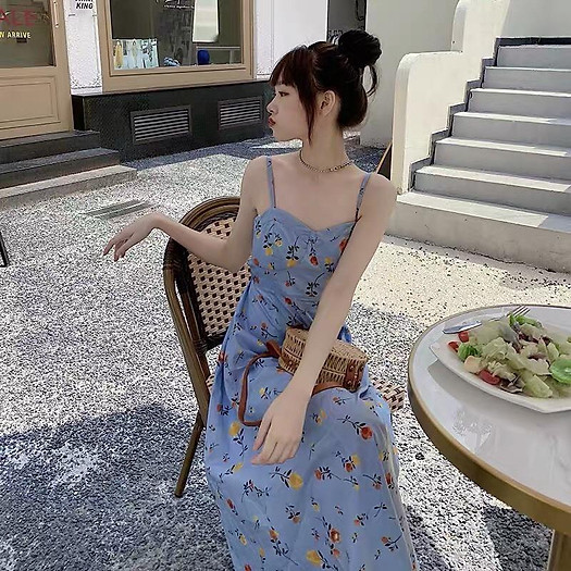 Đầm xanh 2 dây hở lưng hoa nhí