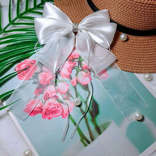 kẹp tóc nơ màu trắng đuôi dài