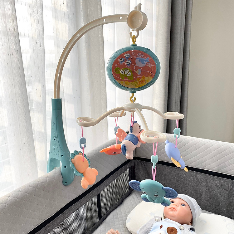 Đồ chơi treo nôi chiếu sao phát nhạc ru ngủ chính hãng Umoo với 12 bài nhạc du dương, truyện kể trước lúc đi ngủ cho bé yêu (100% tiếng anh)