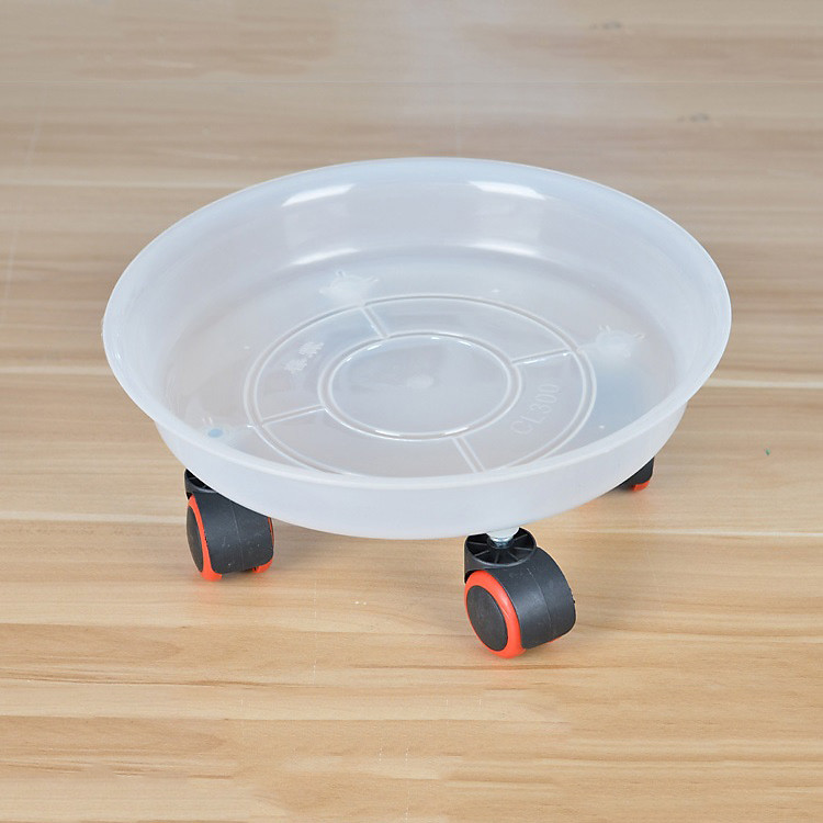 Đế lót chậu hoa bằng nhựa màu trắng có bánh xe tự lắp ráp đường kính 28cm giúp dễ dàng di chuyển chậu cây trong nhà ngoài sân
