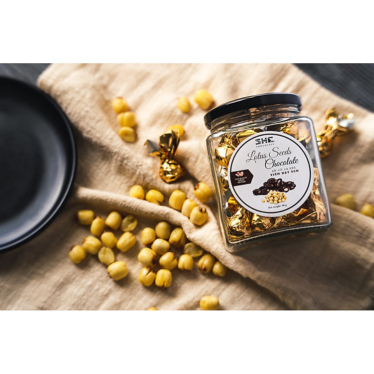 Socola viên Hạt sen - Hũ thủy tinh 90G - SHE Chocolate - Bổ sung năng lượng, đa dạng vị giác. Quà tặng sức khỏe, quà tặng người thân, dịp lễ, thích hợp ăn vặt