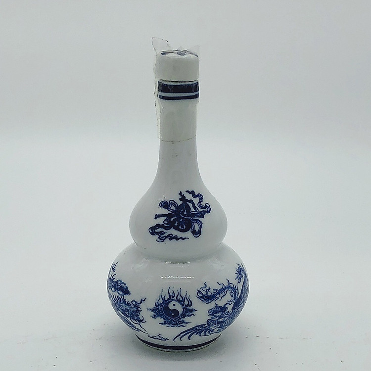 Nậm thờ đựng rượu men xanh lam họa tiết long phụng