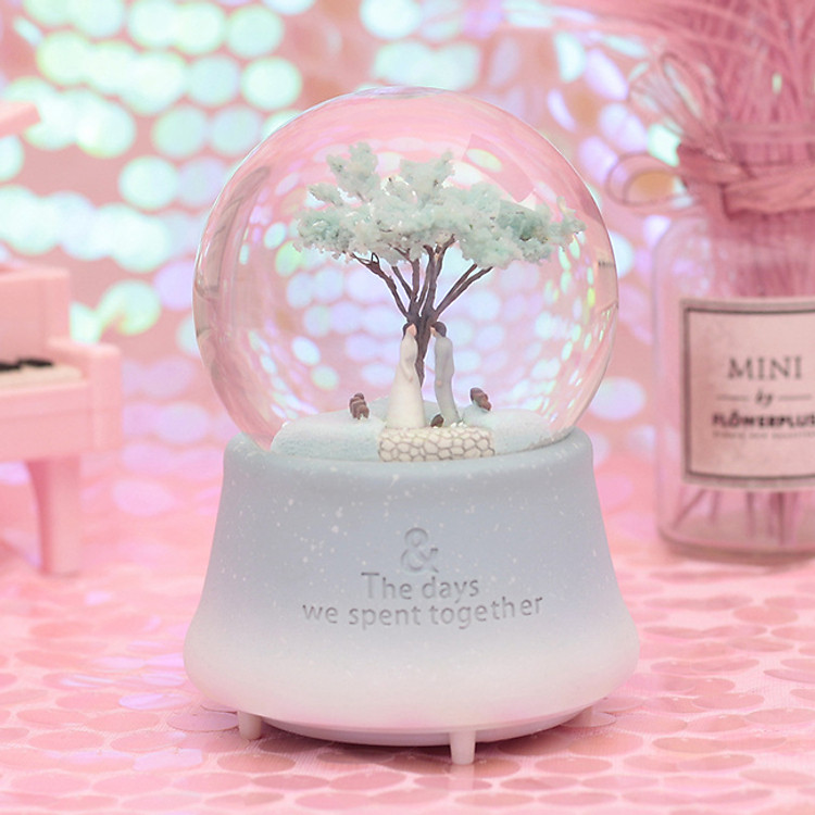 Hộp nhạc quả cầu tuyết chuyện tình Hoa Anh Đào