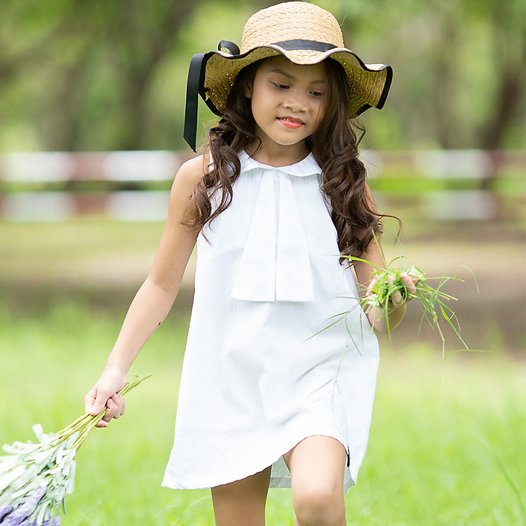 Đầm Bé Gái Trắng Xuông Dây Nơ Dáng Ngắn KIKA GND-0011