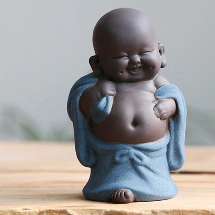 Tượng chú tiểu hành hương