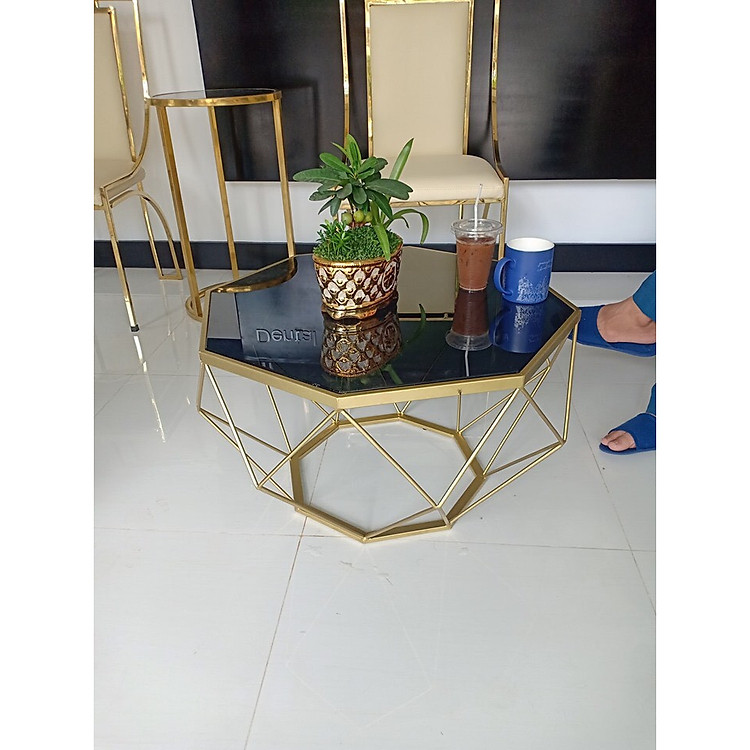 bàn kim cương chân vàng mặt đen