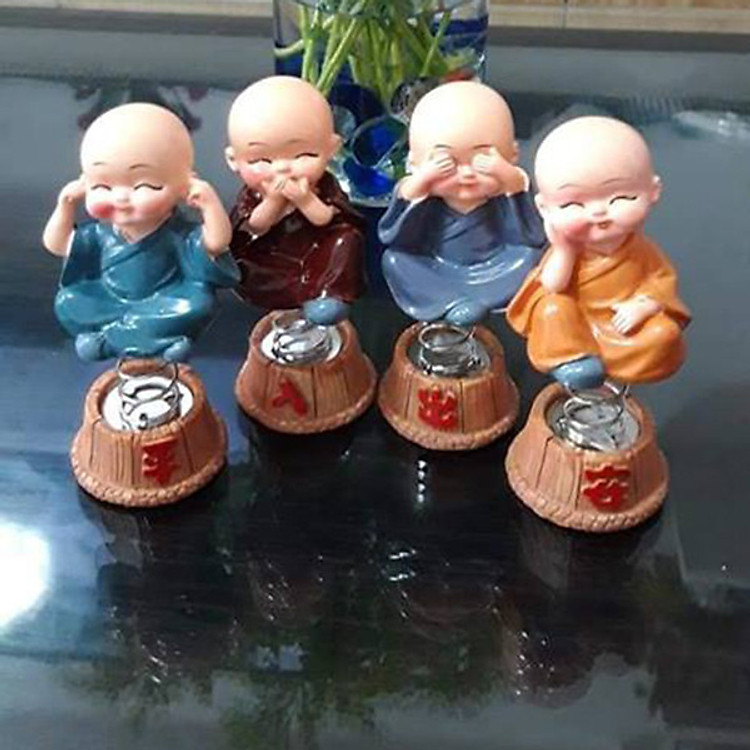 Bộ 4 tượng chú tiểu lắc lư theo xe