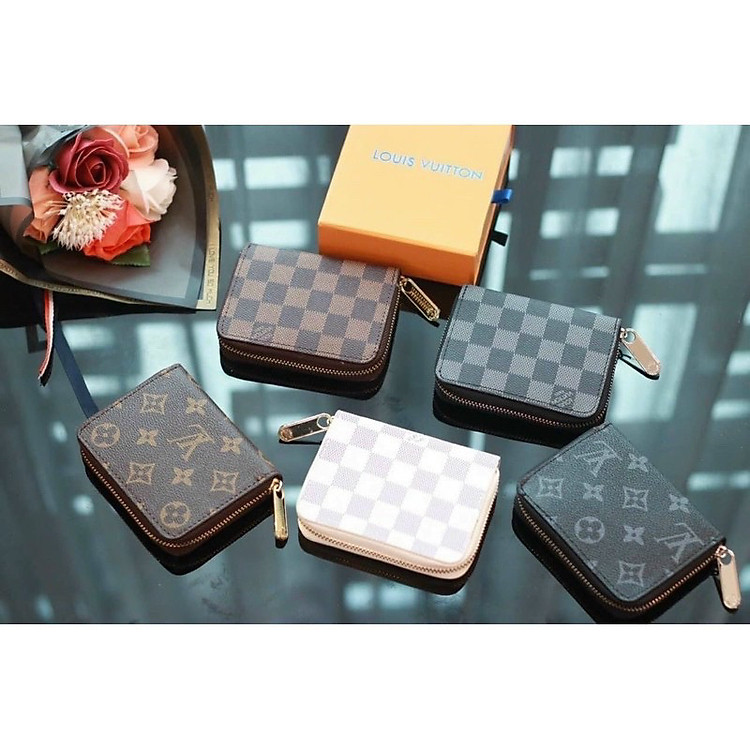 Ví ngắn cầm tay nữ nhiều ngăn da PU cao cấp, chất da mềm mịn .dùng đựng thẻ , giấy tờ xe , đựng tiền nhỏ gọn và tiện lợi ,phong cách nữ tính, trẻ trung , hiện đại