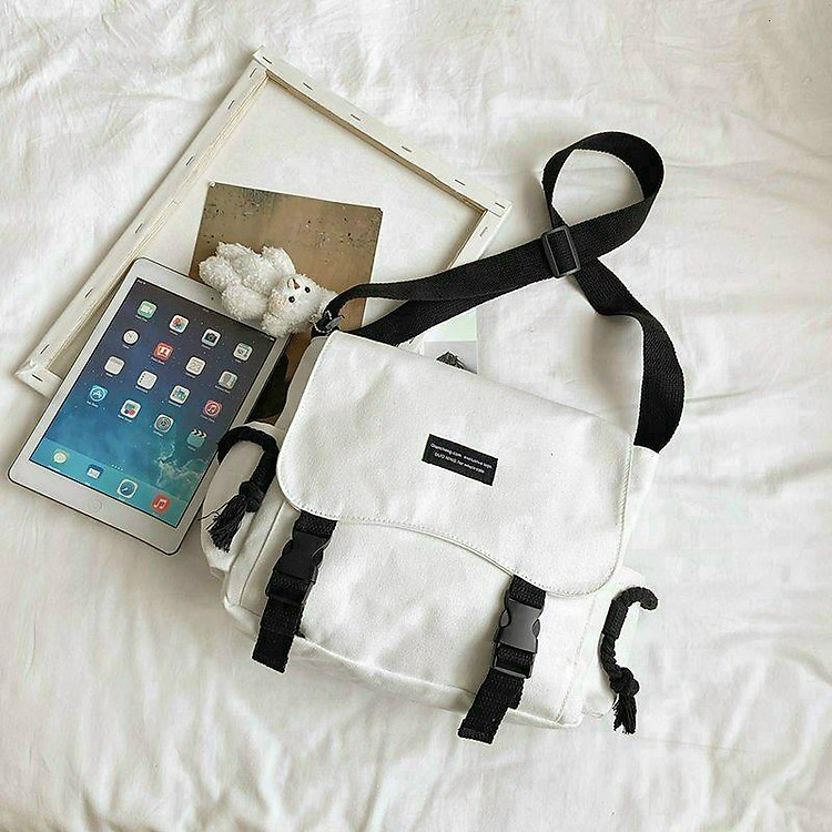 Túi đeo chéo dành cho cả nam và nữ, chất da vải bố dày dặn, kiểu dáng sang trọng trang nhã, phù hợp đi chơi hay đi dạo