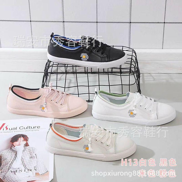 Giày thể thao nữ nền đen sọc trắng- V1