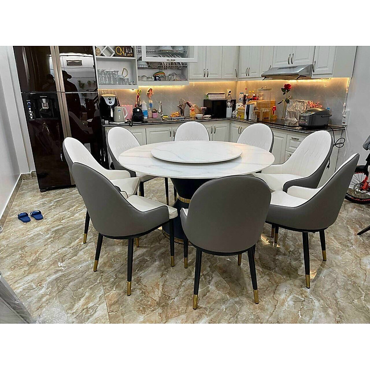 Bộ bàn ghế phòng ăn Juno sofa mặt tròn xoay đá ceramic kèm 8 ghế