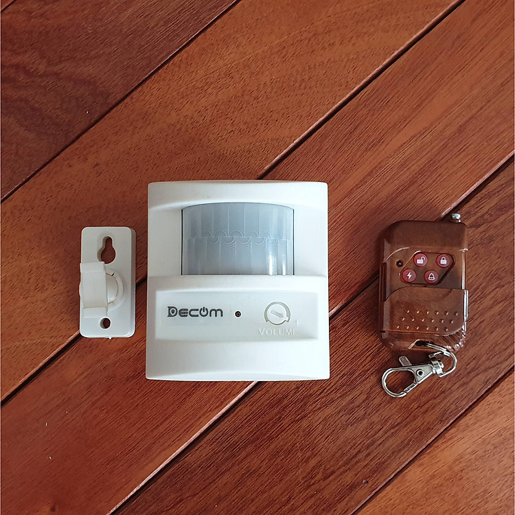 Báo trộm báo khách chống trộm Decom sử dụng mắt cảm biến hồng ngoại dùng điện 220v hoặc dùng pin có điều khiển đi kèm