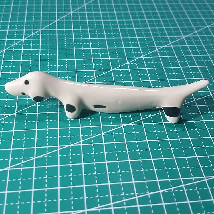 Gác cọ làm móng gốm sứ hình chú chó