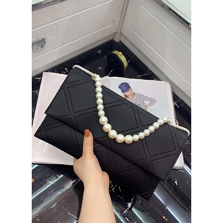 Clutch cầm tay chuỗi ngọc MAIT